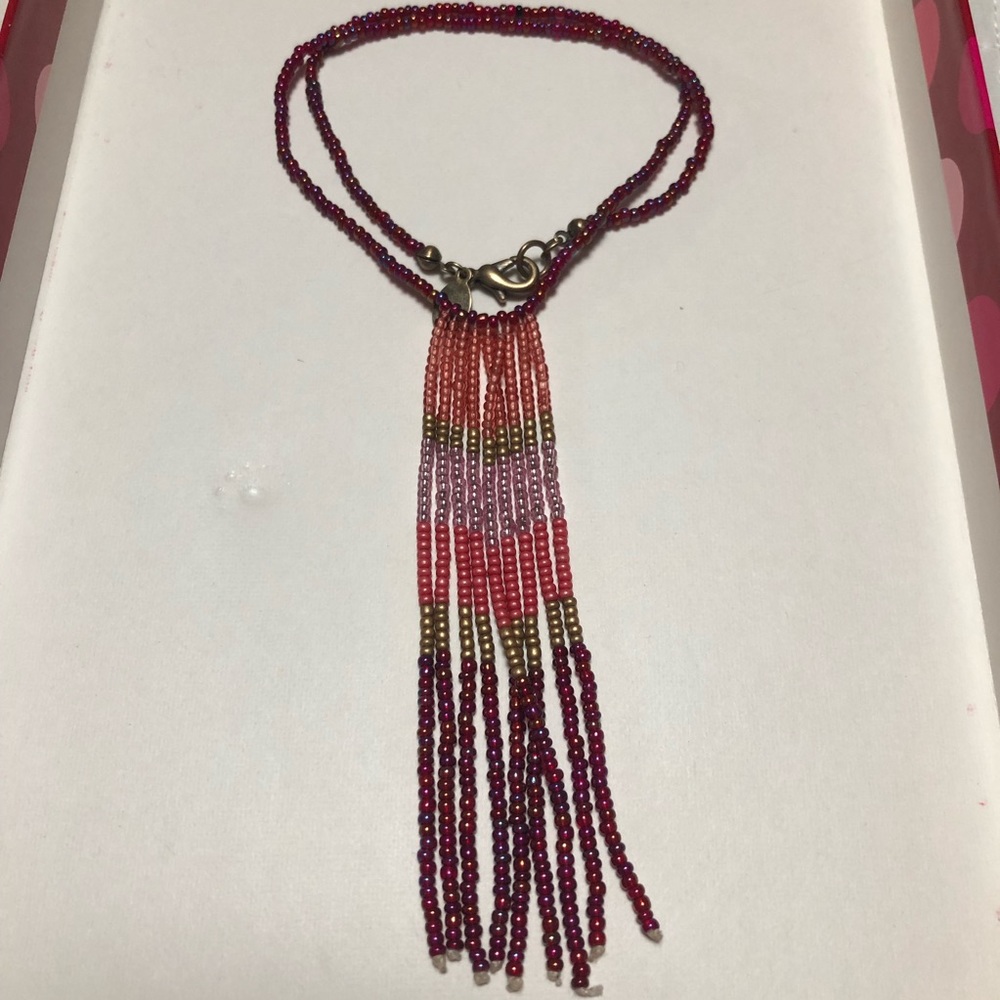 Beaded necklace with beaded fringe detailing